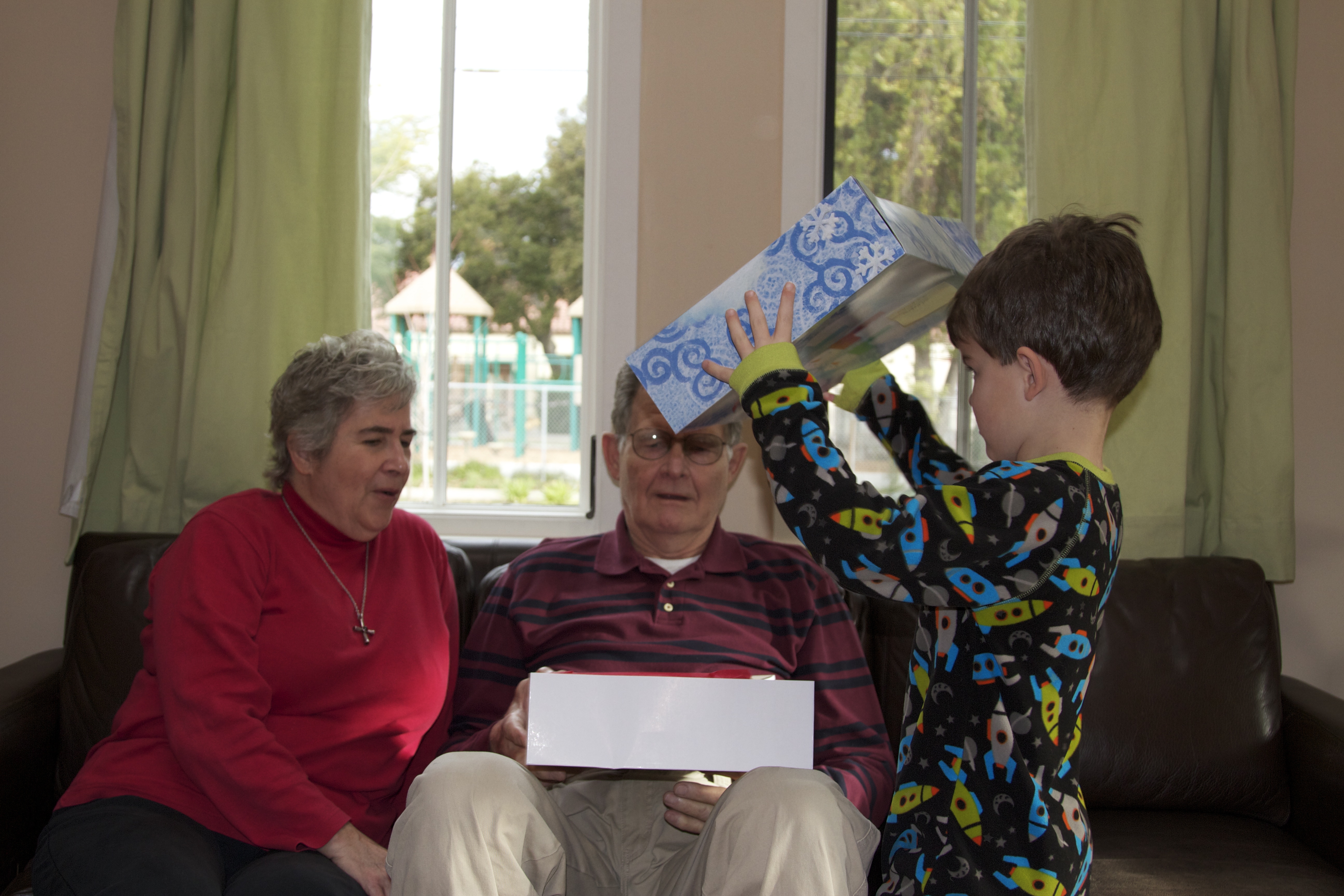 helping them open their presents.