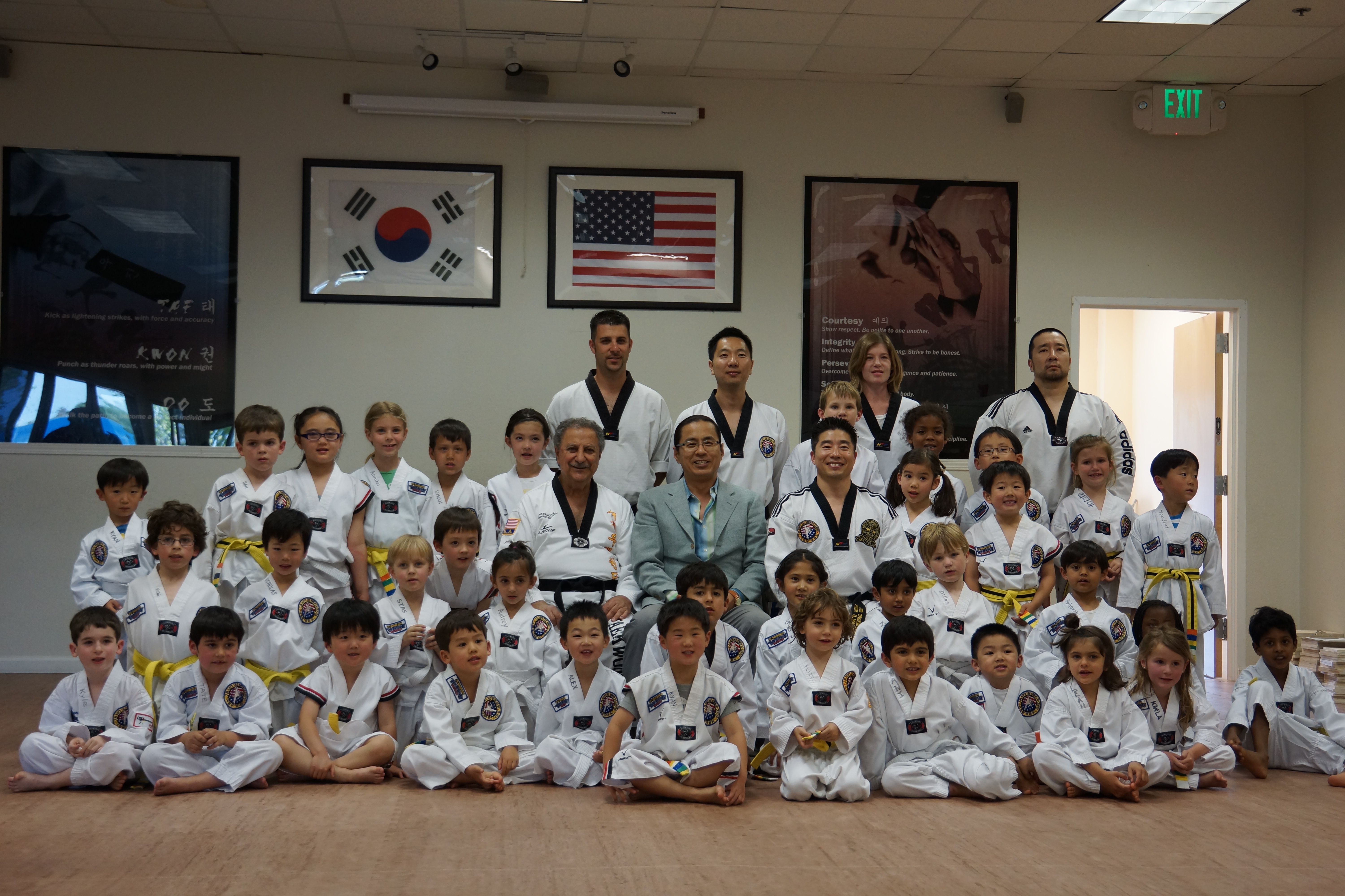 photo taken with all their teachers/masters